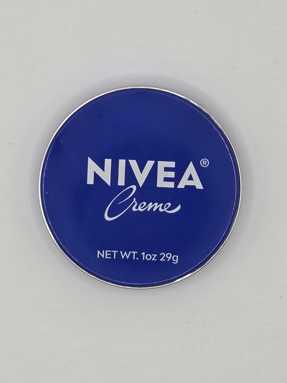 Free with $20+ NIVEA Creme Tin 1 oz